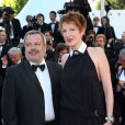  Natacha Polony (habillée en Karl Lagerfeld) et son mari Perico Légasse - Montée des marches du film "Pour une poignée de dollars" pour la cérémonie de clôture du 67e Festival du film de Cannes le 24 mai 2014. 