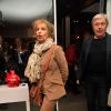Catherine Barma et son mari Philippe Lefebvre - Vernissage de l'exposition "Tout L'Art Du Chat" de Philippe Geluck à la galerie Huberty-Breyne à Paris, le 14 octobre 2014.