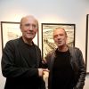 Philippe Geluck et Gérard Miller - Vernissage de l'exposition "Tout L'Art Du Chat" de Philippe Geluck à la galerie Huberty-Breyne à Paris, le 14 octobre 2014.