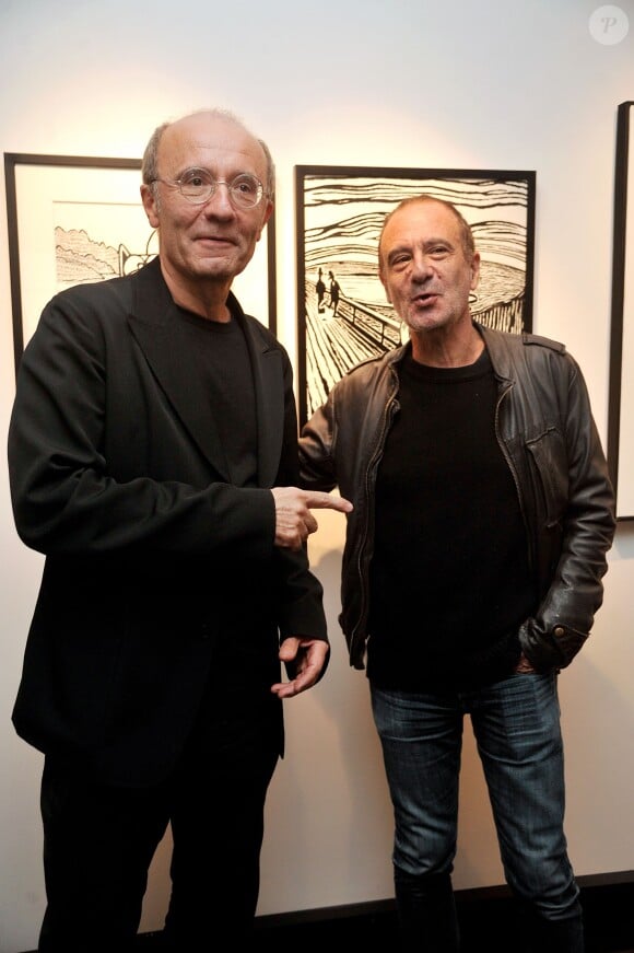 Philippe Geluck et Gérard Miller - Vernissage de l'exposition "Tout L'Art Du Chat" de Philippe Geluck à la galerie Huberty-Breyne à Paris, le 14 octobre 2014.