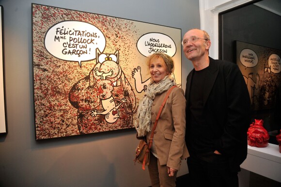 Philippe Geluck, Catherine Barma - Vernissage de l'exposition "Tout L'Art Du Chat" de Philippe Geluck à la galerie Huberty-Breyne à Paris, le 14 octobre 2014.