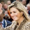  La reine Maxima des Pays-Bas dans un ensemble léopard signé Natan le 7 octobre 2014 dans une agence d'emploi social de Nimègue. 