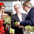 La reine Maxima des Pays-Bas, dans une robe Natan, le 1er octobre 2014 lors de l'inauguration d'un marché à Rotterdam