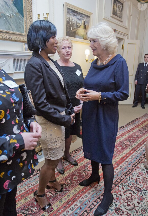 Camilla Parker Bowles à Clarence House le 16 octobre 2014 lors d'une réception pour l'International Credit Union Day