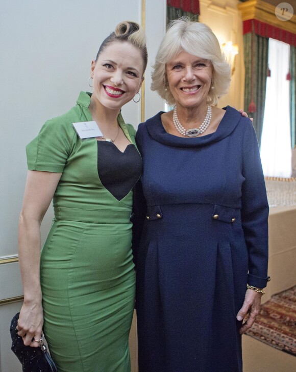 Camilla Parker Bowles à Clarence House le 16 octobre 2014 lors d'une réception pour l'International Credit Union Day