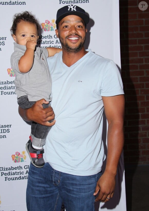 Donald Faison et son fils Rocco lors du 25e gala annuel "A Time For Heroes" pour l'association "Elizabeth Glaser Pediatric AIDS" à Culver City, le 19 octobre 2014.