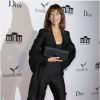 Sophie Marceau porte une pochette Caroline de Marchi lors de la Soirée d'inauguration de la Cite du Cinema à Saint Denis, en France, le 21 septembre 2012