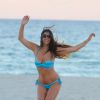 Claudia Romani, en bikini sur une plage de Miami. Le 26 octobre 2014.