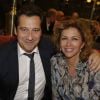 Corinne Touzet et Laurent Gerra lors de la réouverture de L'Alsace sur les Champs-Elysées à Paris, le 27 octobre 2014. 