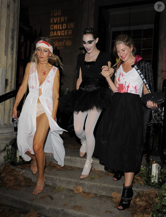 Martha Ward, Jacqui Ainsley en costumes d'Halloween à la sortie de la soirée Unicef à Londres, le 30 octobre 2014.