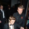David Beckham et sa femme Victoria à la sortie d'une soirée Burberry avec leur fils Romeo à Londres, le 3 novembre 2014.