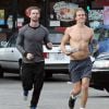Exclusif - Patrick Schwarzenegger fait son jogging avec un ami dans les rues de Los Angeles, le 18 novembre 2014.