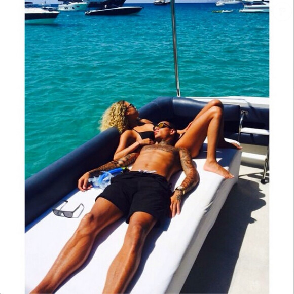 Photo : Gregory Van der Wiel et sa compagne Stéphanie Bertram Rose - photo  issue du compte Instagram du joueur du PSG le 19 juillet 2014 - Purepeople