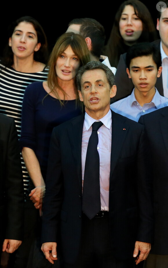 Carla Bruni-Sarkozy et Nicolas Sarkozy lors du meeting de celui-ci à Boulogne-Billancourt le 25 novembre 2014