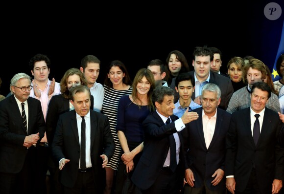 Carla Bruni-Sarkozy et Nicolas Sarkozy lors du meeting de celui-ci à Boulogne-Billancourt le 25 novembre 2014