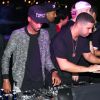 Drake (entouré de son DJ Future the Prince et OB O'Brien) à la PPP Muzik Mansion, nom de la résidence éphémère de Pigalle lors de la foire Art Basel Miami Beach. Le 6 décembre 2014.