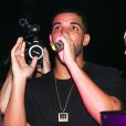 Drake (entouré de son DJ Future the Prince et OB O'Brien) à la PPP Muzik Mansion, nom de la résidence éphémère de Pigalle lors de la foire Art Basel Miami Beach. Le 6 décembre 2014.