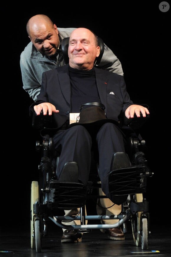 Philippe Pozzo di Borgo et son ami Abdel Sellou, les véritables Intouchables, à Cologne en Allemagne pour un festival de littérature le 10 mars 2013