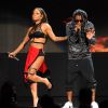 Lil Wayne preste avec Christina Milian lors des American Music Awards 2014. Los Angeles, le 23 novembre 2014.