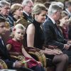 Le roi Philippe et la reine Mathilde de Belgique assistaient le 17 décembre 2014, avec leurs enfants Elisabeth, Gabriel, Emmanuel et Eléonore, au traditionnel concert de Noël, au palais royal, dédié à la mémoire de la défunte reine Fabiola.