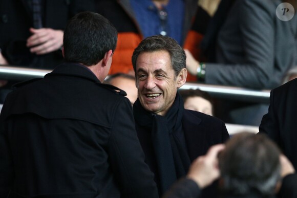 Manuel Valls, Nicolas Sarkozy - People au match PSG-Montpellier lors de la 19ème journée de Ligue 1 au Parc des Princes, le 20 décembre 2014.
