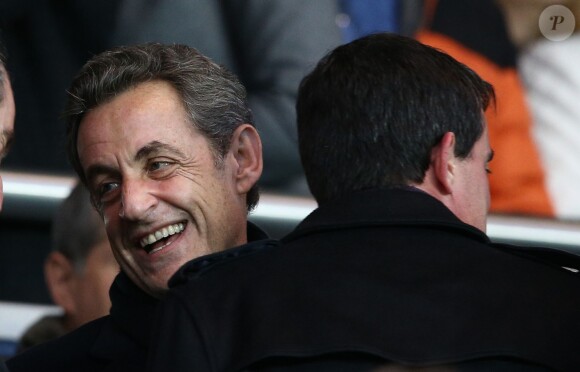 Manuel Valls, Nicolas Sarkozy - People au match PSG-Montpellier lors de la 19ème journée de Ligue 1 au Parc des Princes, le 20 décembre 2014.