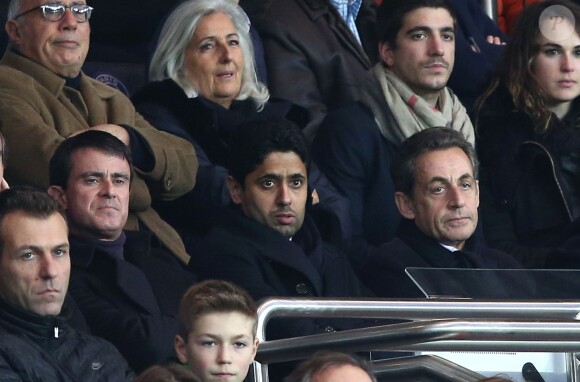 Manuel Valls, Nasser Al-Khelaïfi, Nicolas Sarkozy - People au match PSG-Montpellier lors de la 19e journée de Ligue 1 au Parc des Princes, le 20 décembre 2014.