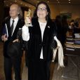  Nana Mouskouri, accompagnee de son mari Andre Chapelle, recoit un prix lors de la ceremonie Elpida a Athenes. Le 16 octobre 2013  
