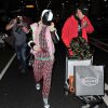 Rita Ora et son compagnon Ricky Hilfiger de retour à l'aéroport de Londres après avoir passé des vacances dans les Caraïbes Le 3 janvier 2015 