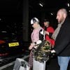 Rita Ora et son compagnon Ricky Hilfiger de retour à l'aéroport de Londres après avoir passé des vacances dans les Caraïbes. Le 3 janvier 2015  