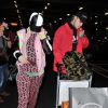 Rita Ora et son compagnon Ricky Hilfiger de retour à l'aéroport de Londres après avoir passé des vacances dans les Caraïbes Le 3 janvier 2015  