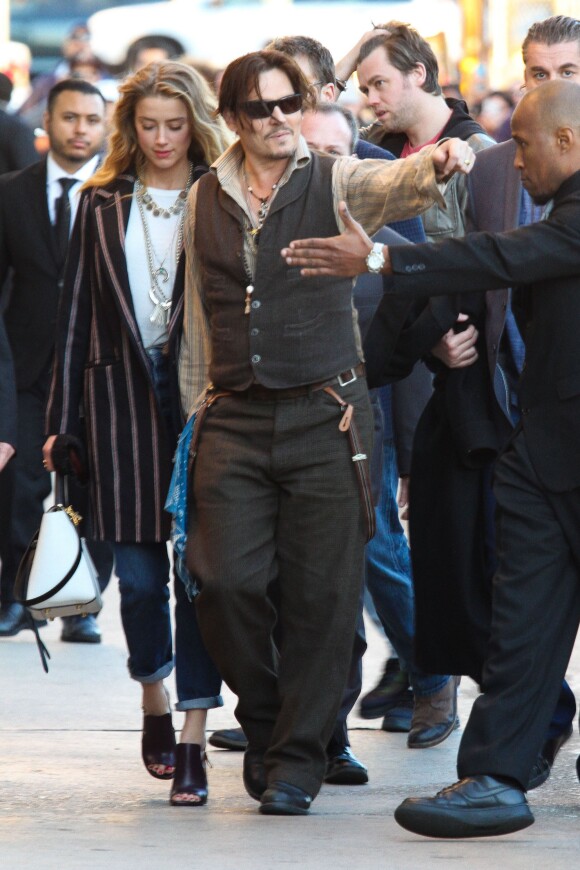 Johnny Depp et Amber Heard arrivent au El Capitan Theatre pour le Jimmy Kimmel Live, Hollywood, Los Angeles, le 15 janvier 2015.