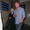 Jessica Simpson (sac Givenchy) et son mari Eric Johnson arrivent à l'aéroport de LAX à Los Angeles, le 1er octobre 2014 