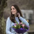 Kate Middleton, enceinte de six mois, lors de ses engagements officiels du 19 janvier 2015. Après quoi, elle s'est envolée pour quelques jours de vacances sur l'Île Moustique, avec William, George et ses parents.