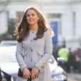 Kate Middleton, enceinte de six mois, lors de ses engagements officiels du 19 janvier 2015. Après quoi, elle s'est envolée pour quelques jours de vacances sur l'Île Moustique, avec William, George et ses parents.