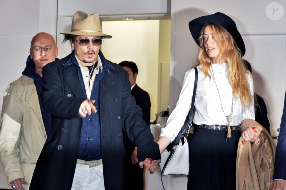 Johnny Depp et Amber Heard arrivent au Haneda Airport, Tokyo, le 26 janvier 2015.