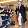 Johnny Depp et sa fiancée Amber Heard arrivent à l'aéroport de Tokyo, le 26 janvier 2015.