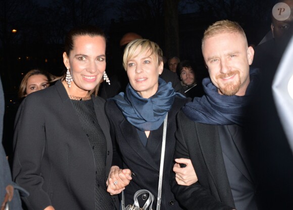 Roberta Armani, Robin Wright et son fiancé Ben Foster arrivent au Palais de Tokyo pour assister au défilé haute couture Giorgio Armani Privé printemps-été 2015. Paris. Le 27 janvier 2015.