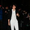 Juliette Binoche arrive au Palais de Tokyo pour assister au défilé haute couture Giorgio Armani Privé printemps-été 2015. Paris. Le 27 janvier 2015.