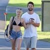 Exclusif - Miley Cyrus et son petit ami Patrick Schwarzenegger, en vacances à Hawaï, se rendent sur la plage de Maui, le 21 janvier 2015.