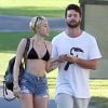 Exclusif - Miley Cyrus et son petit ami Patrick Schwarzenegger, en vacances à Hawaï, se rendent sur la plage de Maui, le 21 janvier 2015.