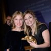 Exclusif - Karin Viard - bijoux Van Cleef, et Louane Emera avec leurs prix (meilleures actrice et révélation) lors de la 20e cérémonie des Prix Lumières à l'espace Pierre Cardin à Paris, le 2 février 2015. 