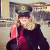 Exclusif - Arielle Dombasle portant une casquette d'officier de l'Armée Rouge pour rendre hommage au sublime ballet de l'Armée Rouge sur la place Tian'anmen. À Pékin, le 27 janvier 2015.