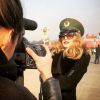 Exclusif - Arielle Dombasle portant une casquette d'officier de l'Armée Rouge pour rendre hommage au sublime ballet de l'Armée Rouge sur la place Tian'anmen. À Pékin, le 27 janvier 2015.