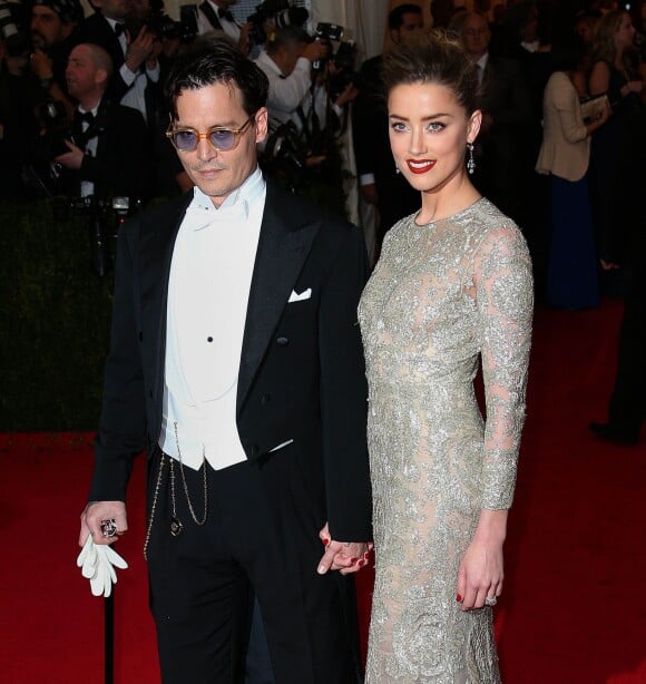 Johnny Depp et sa fiancée Amber Heard à New York, le 5 mai 2014.