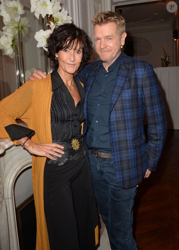 Chrystelle Labaude et Xavier Deluc participent au cocktail pour fêter le 100e épisode de la série Section de recherches et le lancement de la diffusion de la 9e saison, à Paris, le 5 février 2015.