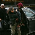 Kim Kardashian, Kanye et North West arrivent à leur appartement, à New York. Le 9 février 2015.