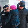 La chanteuse Pink, son mari Carey Hart et leur fille Willow se promenent a New York, le 12 decembre 2013. 