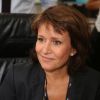 Carole Rousseau - Courtier d'un jour pour encourager les clients à passer ce jour là le maximum d'ordres dans la salle des marchés d'Aurel BGC Rue Vivienne à Paris. Le 11 septembre 2014.