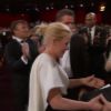 Oscars 2015 : Patricia Arquette reçoit le prix du meilleur second rôle pour Boyhood. Son prix lui est remis par le chevelu Jared Leto